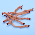 Enrico Puglisi Crab Claws in soft, fuzzy material shaped like small crab legs with red tips, designed as fishing tackle for musky and fly fishing.