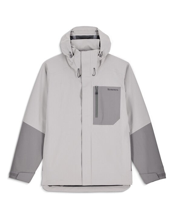 Simms Men's Challenger Rain Jacket in light gray with darker gray accents, featuring a front zipper, adjustable hood, chest pocket with zipper, and Velcro wrist closures for fishing and outdoor protection.
