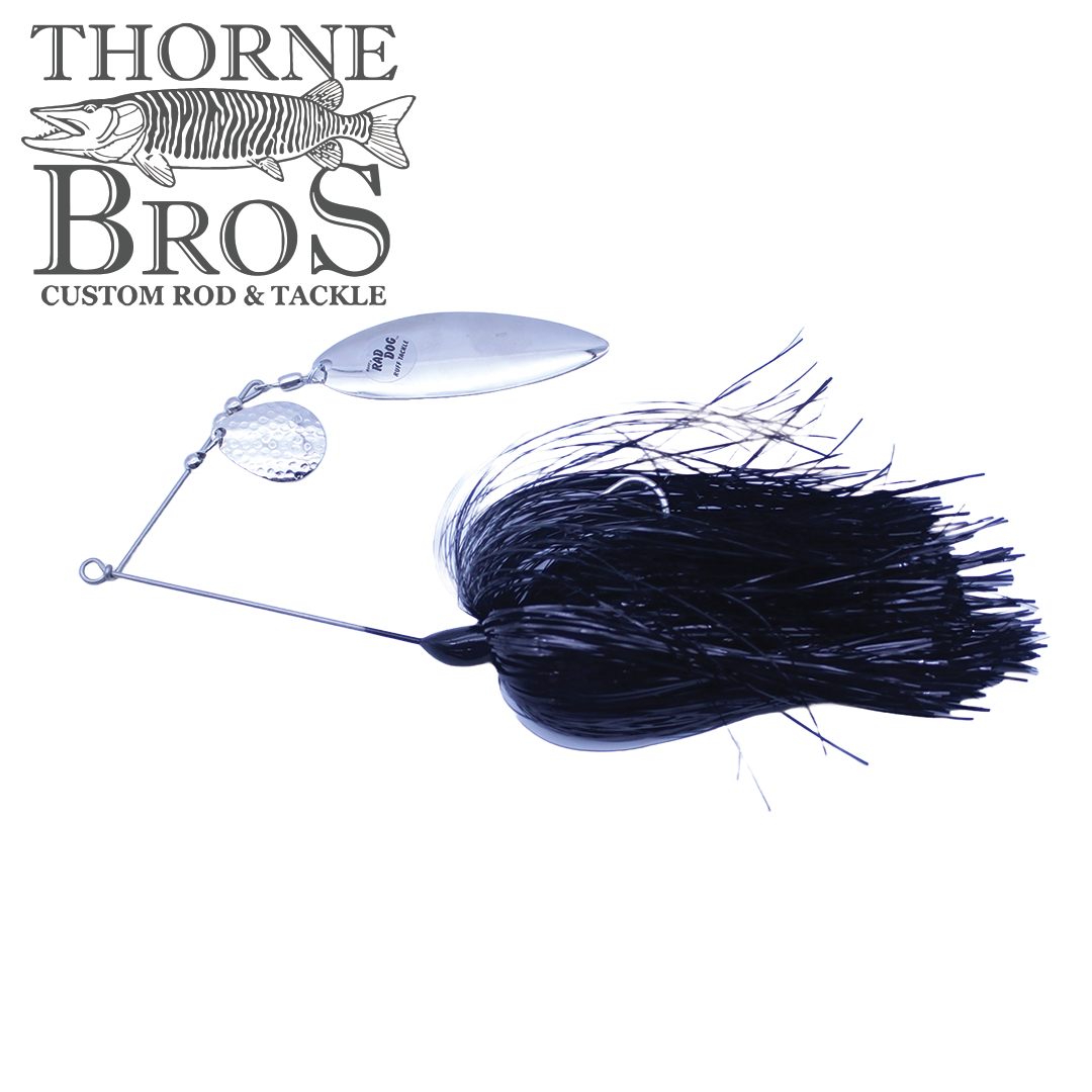 Ruff Tackle Tinsel Dog Tandem Spinnerbait featuring dual silver spinning blades and a black tinsel skirt designed for effective fishing lure action.