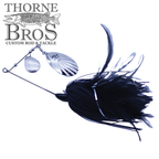 Ruff Tackle Rad Dog Tandem Spinnerbait featuring dual silver spinning blades and black feathered skirt designed for effective fishing tackle use at Thorne Bros.