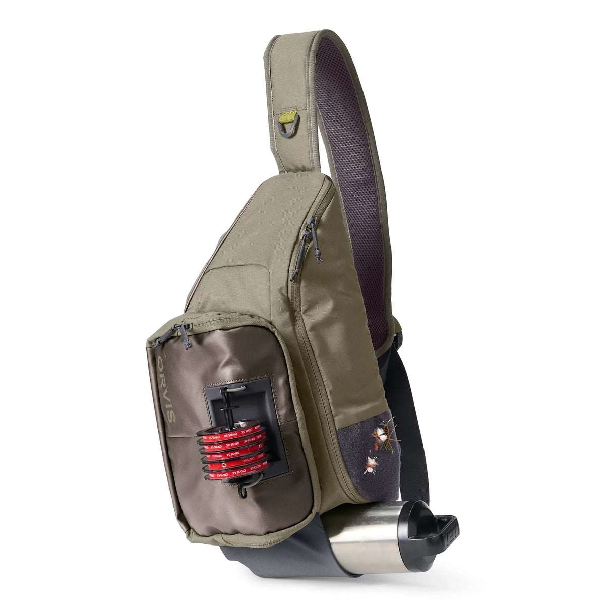Orvis Sling Pack in olive and brown tones with multiple zippered compartments, featuring a front fishing line spool holder and a side mesh pocket, designed for convenient fishing tackle storage.