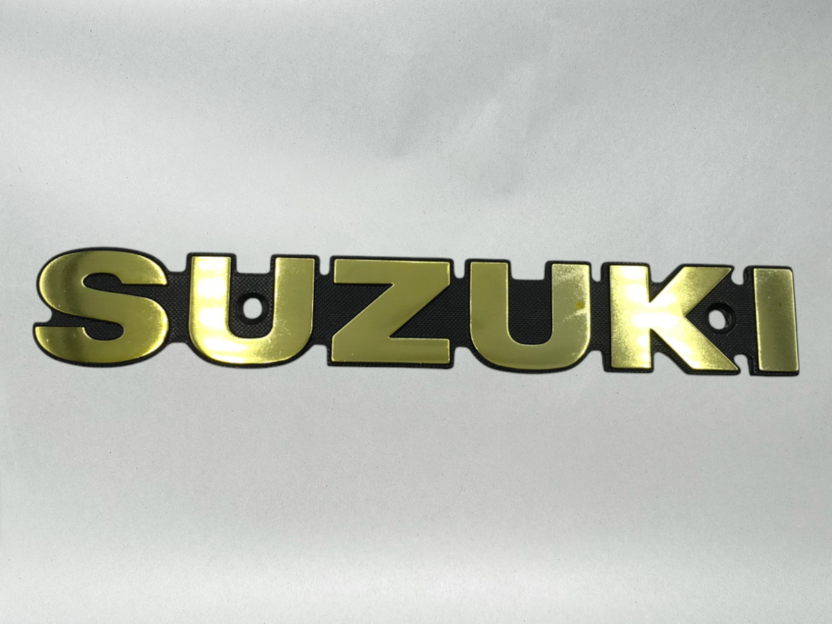 Suzuki OEM Gold Fuel Tank Emblem 68111-45010 / gs1000 gs850 gs750 gs550