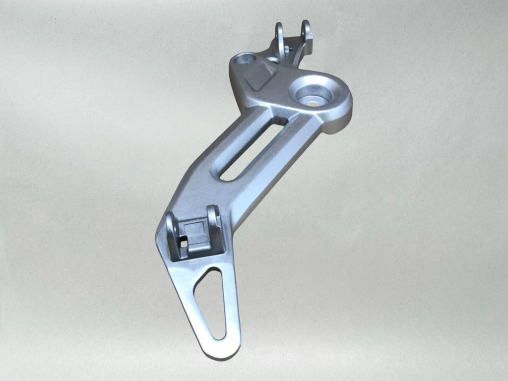 Honda OEM LEFT FOOTPEG BRACKET 22-24 GROM 125  50700-K26-G00