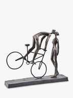 Libra Interiors Playful Kissing Couple on a Bike Sculpture - Metallic Bronze