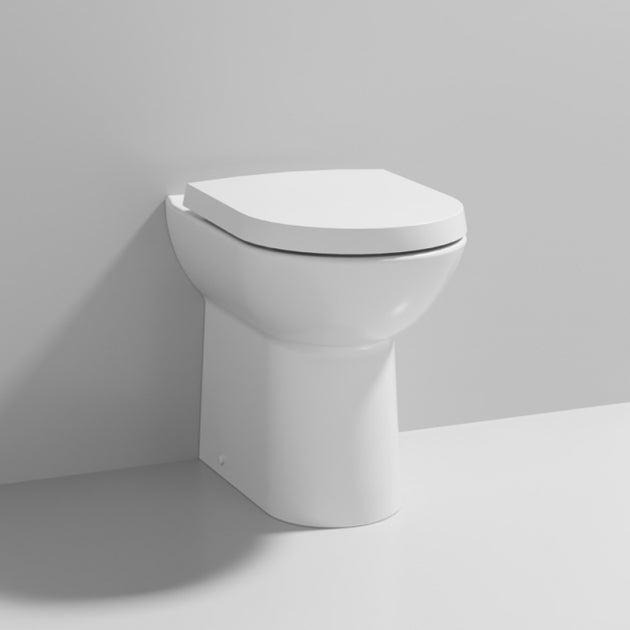 Clinton Comfort Height Back to Wall Toilet With Seat - White