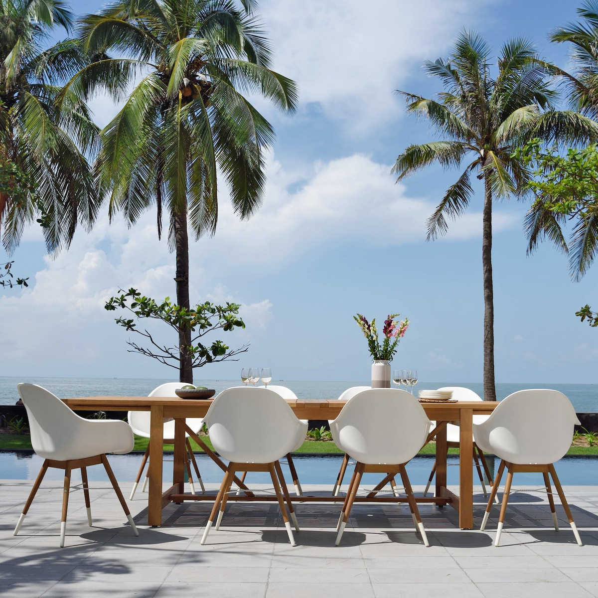 Leyland 9-Piece Weather-Resistant Outdoor Teak Dining Set with Armchairs