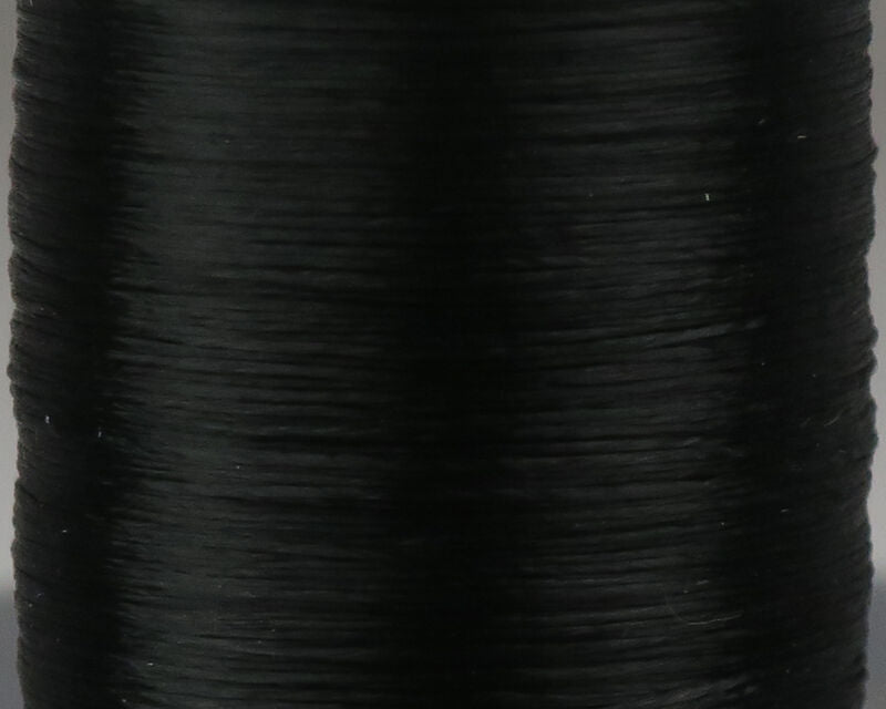 Close-up image of black thread spool showing the smooth texture of Danville Rayon 4 Strand Floss used for custom musky and ice fishing rods.