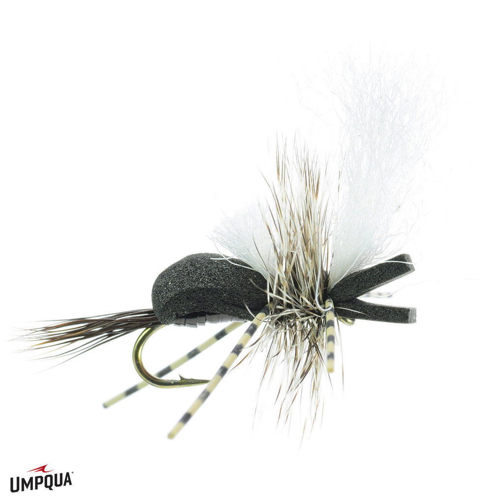 Hippie Stomper fishing lure designed with black foam body, striped legs, natural feathers, and a white wing to mimic an insect for fly fishing and musky tackle.