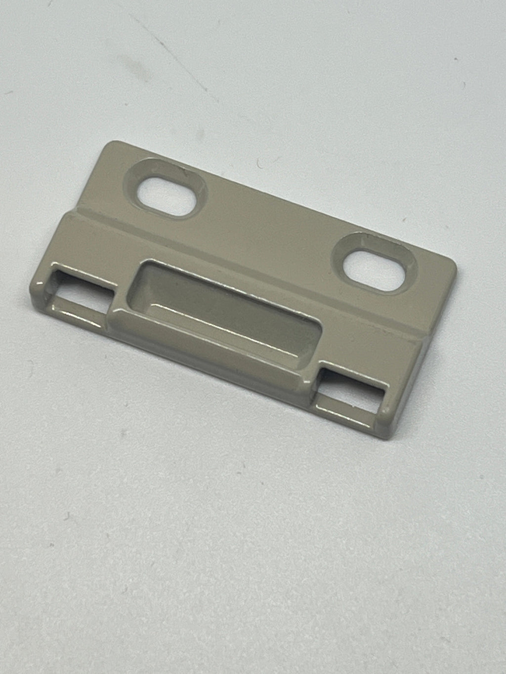 Image of C1010K 23894 Amesbury Truth Positive Action Lock Face Mount keeper.  Known Part Numbers: 2009688, 2009689, 2009690. Almond color metal part on white background.