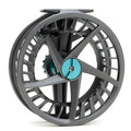Lamson Liquid Max fly fishing reel in gray with turquoise accents, featuring a large arbor design and lightweight, durable construction for smooth line retrieval.
