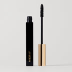 Master ||  Clean Lash Mascara with Mascara wand next to open tube