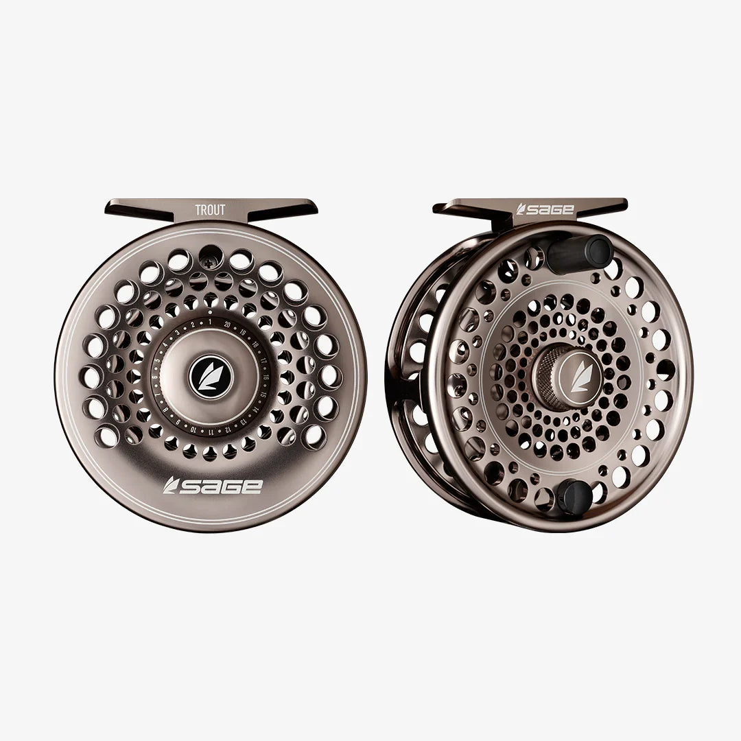 Sage Trout Series Fly Reel shown from front and side views, featuring a metallic finish with circular perforations and ergonomic handles designed for precision fly fishing.