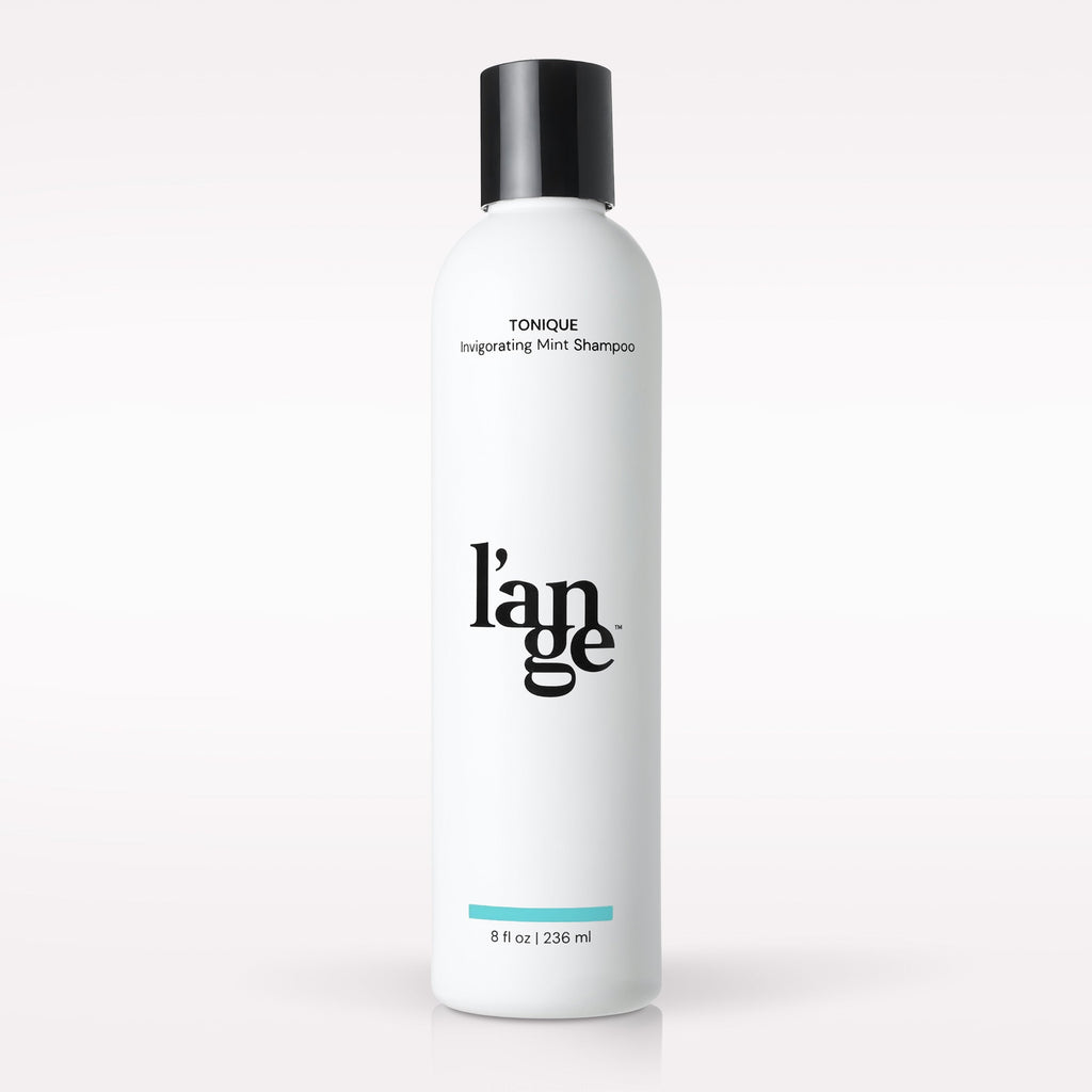 L’ange Tonique Invigorating Mint Shampoo on a blank background 