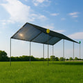 Black 12' x 20' mesh tarp canopy providing large beach shade coverage