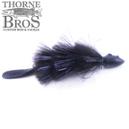Baby Beaver Mini Beaver fishing lure in black with feathered body, shiny accents, textured tail, and a small weighted head designed for musky fishing.