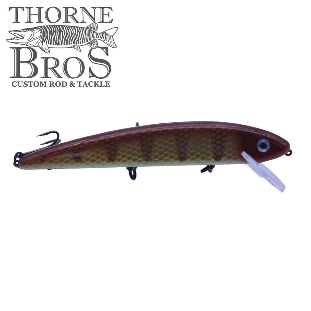 Grandma Lures 9" Crankbait fishing lure in brown and yellow pattern with realistic scale texture, detailed eye, and two treble hooks for effective fishing tackle.