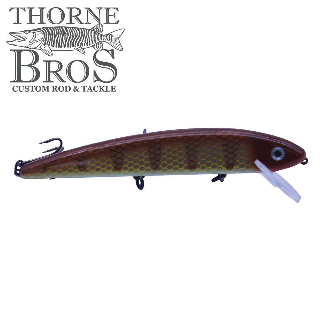 Grandma Lures 9" Crankbait fishing lure in brown and yellow pattern with realistic scale texture, detailed eye, and two treble hooks for effective fishing tackle.