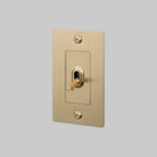 Buster + Punch NTG-054036 Linear 1-Gang Toggle Switch Without Logo, 15A, Single Pole/3-Way, Brass