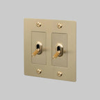 Buster + Punch NTG-054047 Linear 2-Gang Toggle Switch Without Logo, 15A, Single Pole/3-Way, Brass