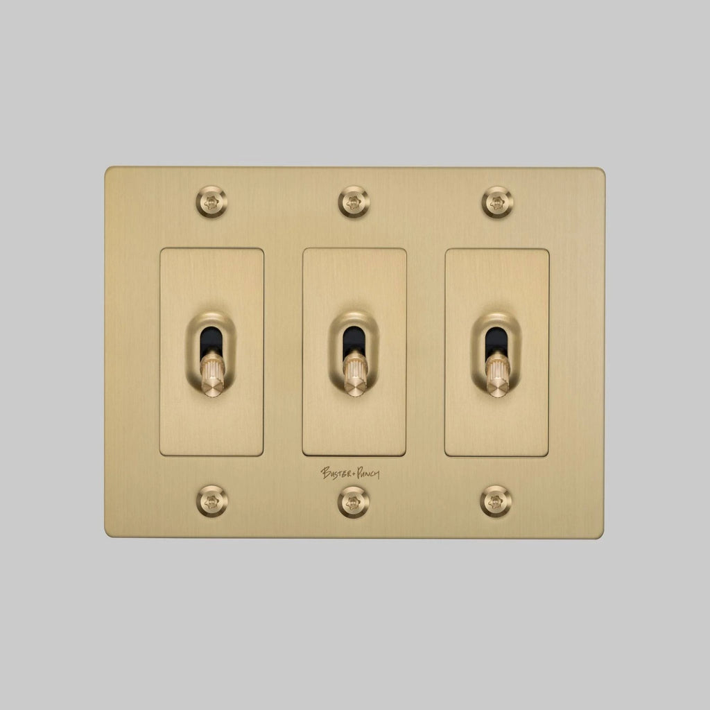 Buster + Punch NTK-054392 Linear 3-Gang Toggle Switch With Logo, 15A, Single Pole/3-Way, Brass