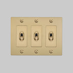 Buster + Punch NTK-054397 Linear 3-Gang Toggle Switch Without Logo, 15A, Single Pole/3-Way, Brass