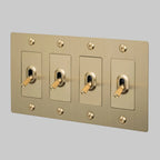 Buster + Punch NTK-054417 Linear 4-Gang Toggle Switch Without Logo, 15A, Single Pole/3-Way, Brass