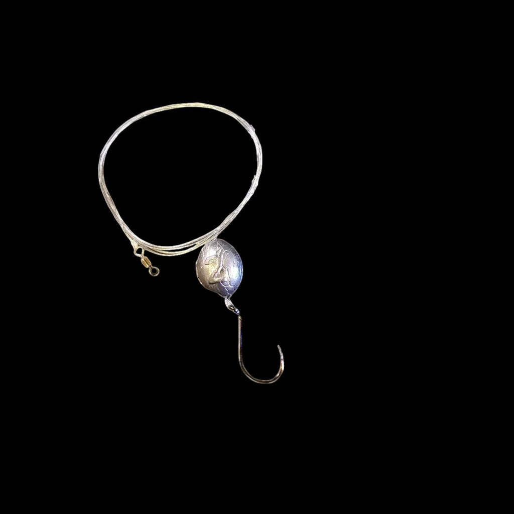 Dogfish Tackle & Marine 2-pack hogfish fishing rig with 30lb fluorocarbon leader, 4/0 hook, and 2oz egg sinker.
