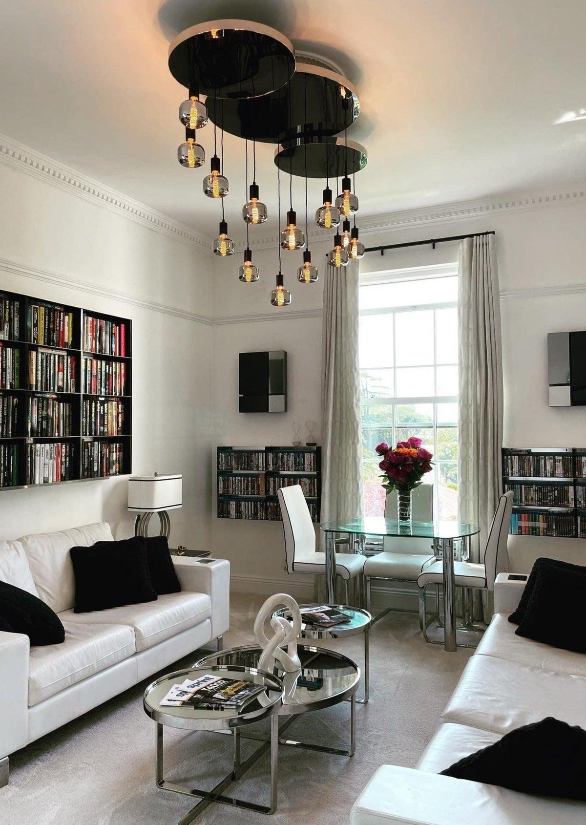Modern Waves: Stainless Steel Mirrored Chandelier