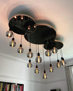 Modern Waves: Stainless Steel Mirrored Chandelier