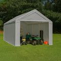 Silver 12' x 20' enclosed tarp canopy providing commercial weather shelter