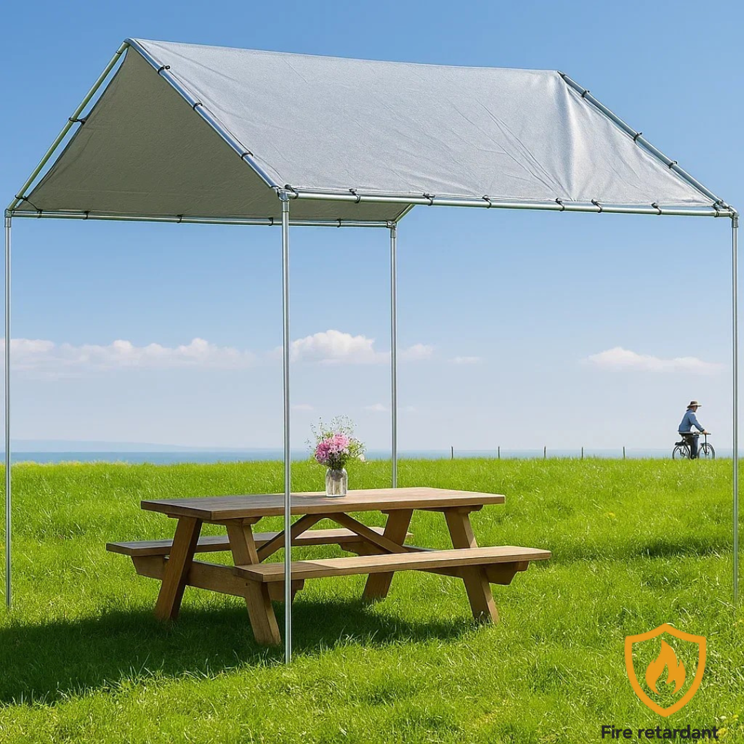 Silver 10' x 10' tarp cover creating backyard shade protection