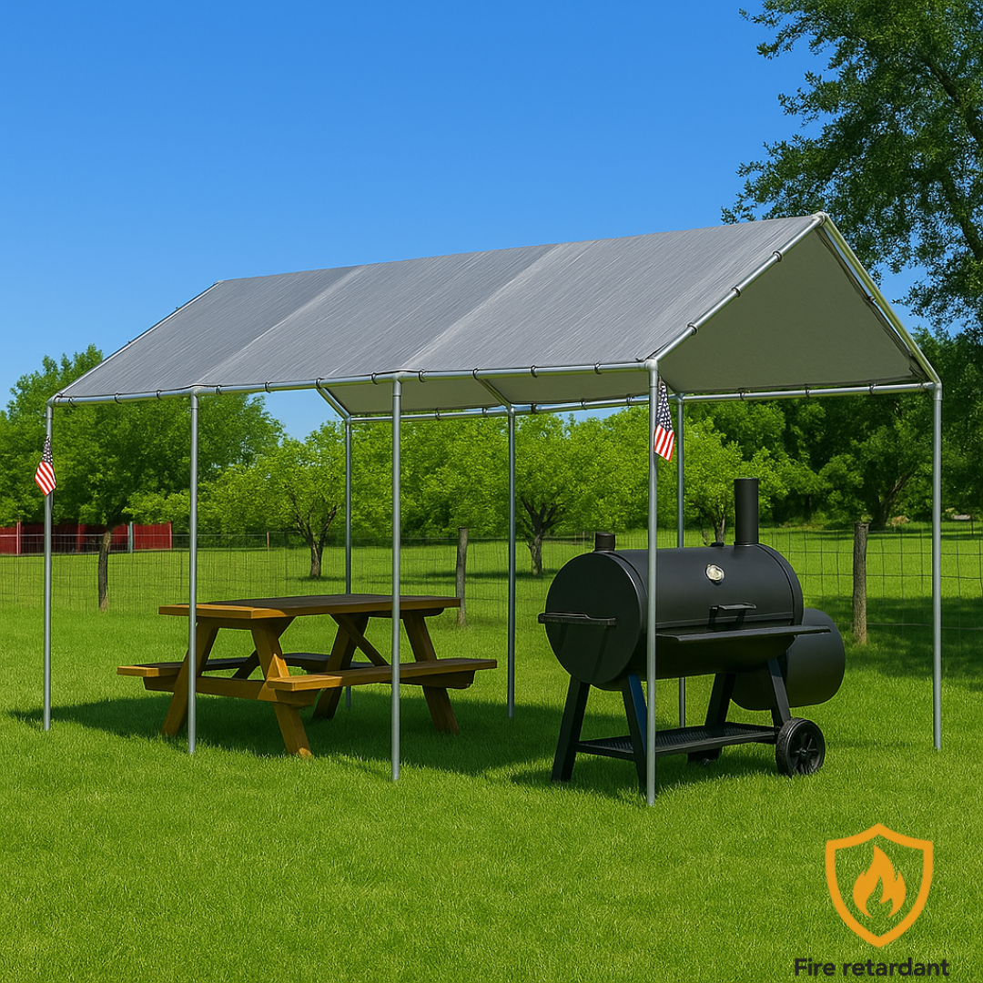 Silver 10' x 20' tarp cover creating shade above a park picnic setup