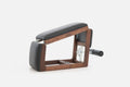 NOHRD TriaTrainer side view in walnut and black leather